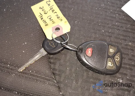 2012 Chevrolet Traverse 1Lt z USA, uszkodzony, nr VIN 1GNKVGEDXCJ331902